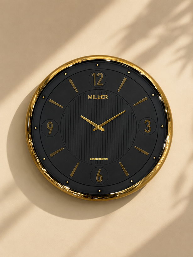 ساعت دیواری برند میلر Miller --704 با قاب فلز ابکاری و صفحه وکیوم و پنج سال ضمانت شرکتی