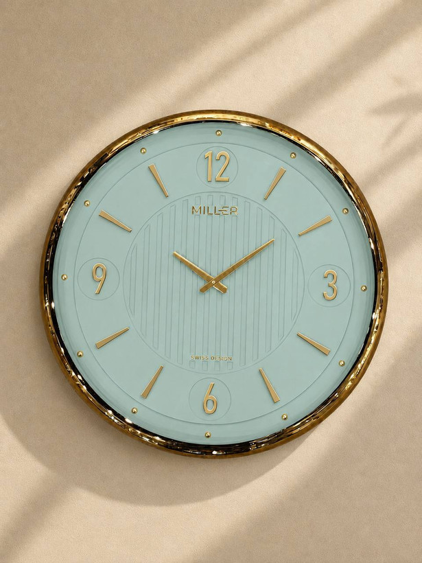 ساعت دیواری برند میلر Miller 604 قطر ۶۰ با قاب فلز ابکاری و صفحه وکیوم و پنج سال ضمانت شرکتی